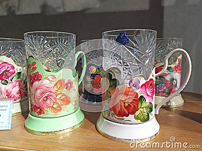 Zhostovo painted glasses in Zhostovo factory shop, Moscow Region Editorial Stock Photo