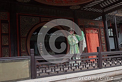 ZHOUZHUANG, CHINA: Talented opera performer singing Kunqu Opera, one of the oldest forms of Chinese opera, at Zhouzhuang Ancient O Editorial Stock Photo