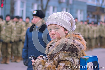 Zhytomyr, Ukraine - February 26, 2016: Girl on Military military parade, rows of soldiers Editorial Stock Photo