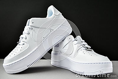 Zhytomyr, Ukraine - June 1, 2020: Nike Air Force 1 Sage white sneakers product shot on gray background. Illustrative editorial Editorial Stock Photo