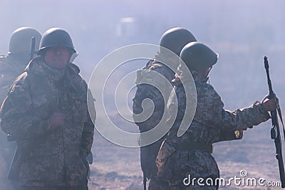 Zhytomyr, Ukraine - March 5, 2015: Front Line. Military attack on battlefield from ambush Editorial Stock Photo