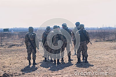 Zhytomyr, Ukraine - March 5, 2015: Front Line. Military attack on battlefield from ambush Editorial Stock Photo