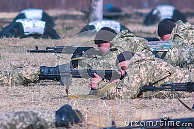 Zhytomyr, Ukraine - March 5, 2015: Front Line. Military attack on battlefield from ambush Editorial Stock Photo