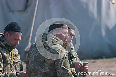 Zhytomyr, Ukraine - March 5, 2015: Front Line. Military attack on battlefield from ambush Editorial Stock Photo