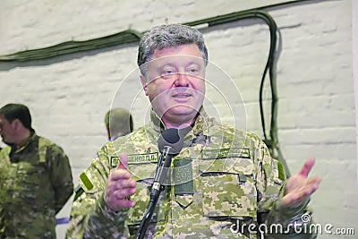 ZHYTOMYR, UKRAINE - Oct 10, 2014: President Petro Poroshenko took part in opening tank factory Editorial Stock Photo