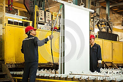 Zinc mine. engineer control machine in factory. Editorial Stock Photo