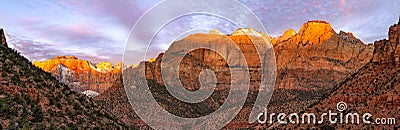 ZION NATIONAL PARK OVERLOOK TRAIL WITH CLOUDS ALPINE GLOW Stock Photo