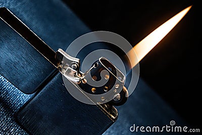 Zippo lighter closeup with flame Stock Photo