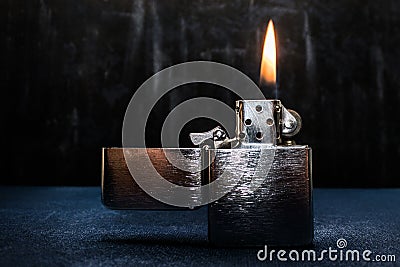 Zippo lighter closeup with flame Stock Photo