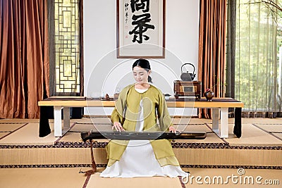 Zither performance-China tea ceremony Stock Photo