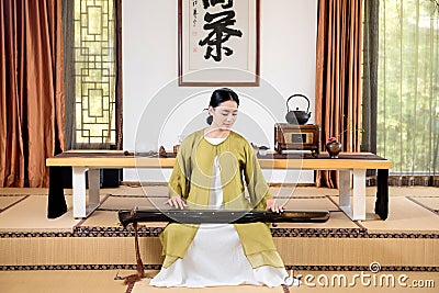 Zither performance-China tea ceremony Stock Photo