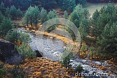 Zlatibor mountain and Crni Rzav river. Autumn landscape with foggy atmosphere Stock Photo