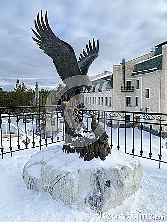 Zlatoust, Chelyabinsk region, Russia, January, 19, 2020. Eagle that brought fish to a chick in the mountain Park named after Bazho Editorial Stock Photo