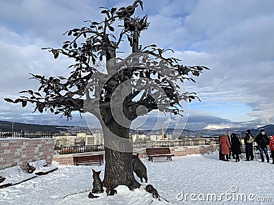 Zlatoust, Chelyabinsk region, Russia, January, 19, 2020. People walking near Tree of wishes in mountain Park named after Bazhov o Editorial Stock Photo