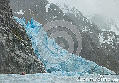 Zodiac Approaching the Glacier Stock Photo