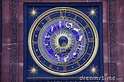 Zodiac signs on clock Stock Photo