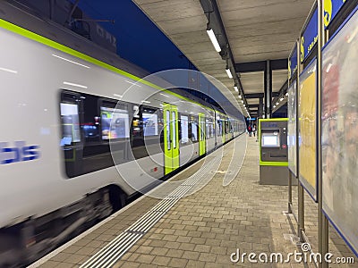 Zollikofen train station near Bern with BLS RABe 515 026 train Editorial Stock Photo