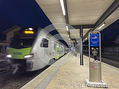 Zollikofen train station near Bern with BLS RABe 515 026 train Editorial Stock Photo