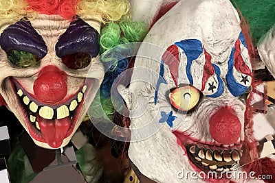 Zombie scary clown in a shop Halloween Costume Store Stock Photo