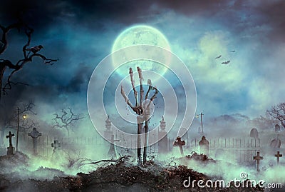 Zombie skeleton hand rise from the grave Stock Photo