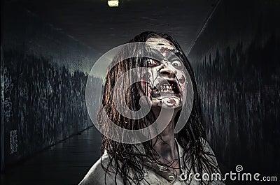 Zombie woman with bloody face Stock Photo