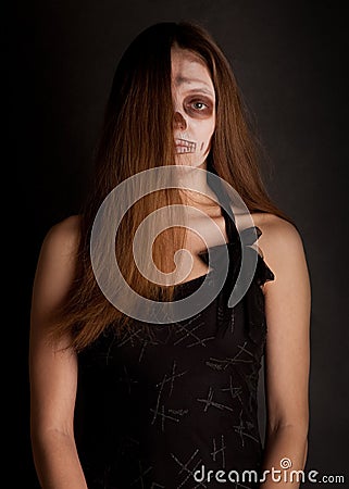 Zombie woman looking to the camera Stock Photo