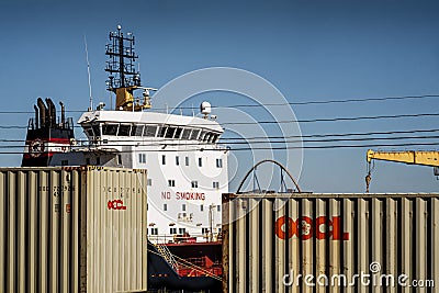 Montreal port scene with moored boat and containers Editorial Stock Photo