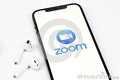 Zoom mobile logo app on screen smartphone Editorial Stock Photo