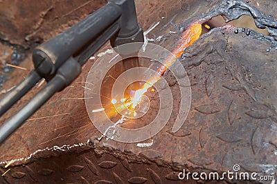 Zoom View Oxygen Acetylene Cutting Torch and Sparkle Stock Photo