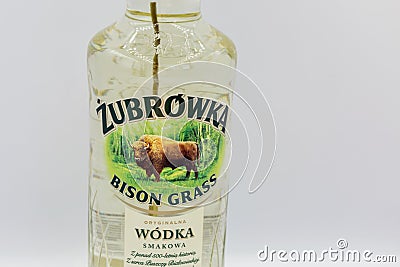 Zubrowka Bison Grass vodka bottle closeup against white bacground Editorial Stock Photo