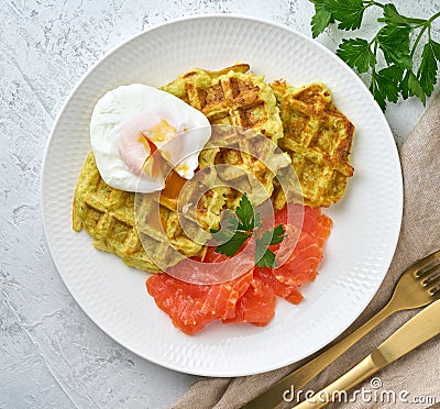 Zucchini waffles with salmon and benedict egg, fodmap diet top view Stock Photo