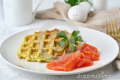 Zucchini waffles with salmon, fodmap diet side view closeup Stock Photo