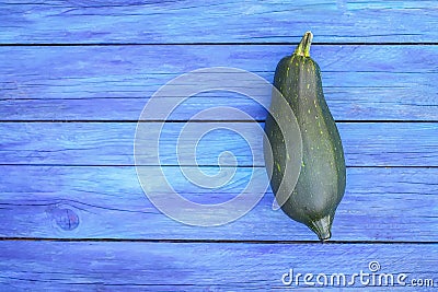 Zucchini on wooden boards outdoors Stock Photo
