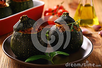 Zucchinies stuffed with meat and vegetables. Stock Photo
