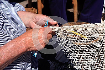 Weaving Fishing Nets At The Zuiderzee Open Air Museum, The Netherlands Stock Photo