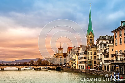 Zurich city center, Switzerland. Zuerich old town with famous Fraumunster and Munsterbrucke bridge on bank of river Stock Photo