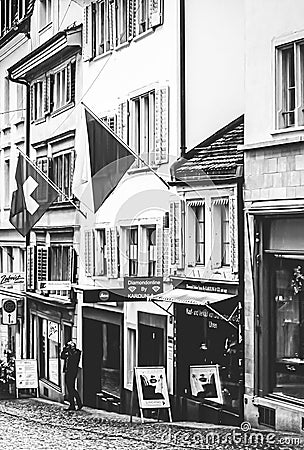 Vintage monochrome view of historic Old Town, shops and luxury stores near main downtown Bahnhofstrasse street, Swiss Editorial Stock Photo