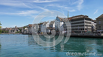 ZURICH, SWITZERLAND - JULY 04, 2017: View of historic Zurich city center, Limmat river and Zurich lake, Switzerland. Zurich is a l Editorial Stock Photo