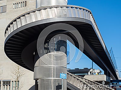 Zurich, Switzerland - March 5th 2022: Modern walking bridge Negrellisteg with its characteristic spiral stair. Editorial Stock Photo