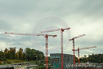 Zurich, Switzerland-October 18,2019:The team work crane Construction build the building near high way in Zurich, Switzerland Editorial Stock Photo