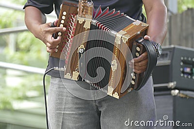 Zydeco Accordian player entertains the crowd Stock Photo