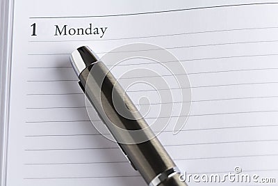 Îœetal pen on a calendar Stock Photo