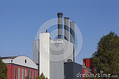 Ã˜rsted Orsted Oersted logotype on building. Danish renewable company power plant factory producing electricity and energy Editorial Stock Photo
