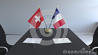 Флаги Швейцарии и Франции и бумаги на таблице Переговоры и подписание международного соглашения схематическо бесплатная иллюстрация Флаги Швейцарии и Франции и бумаги на таблице Переговоры и подписание международного соглашения схематическо бесплатная иллюстрация
