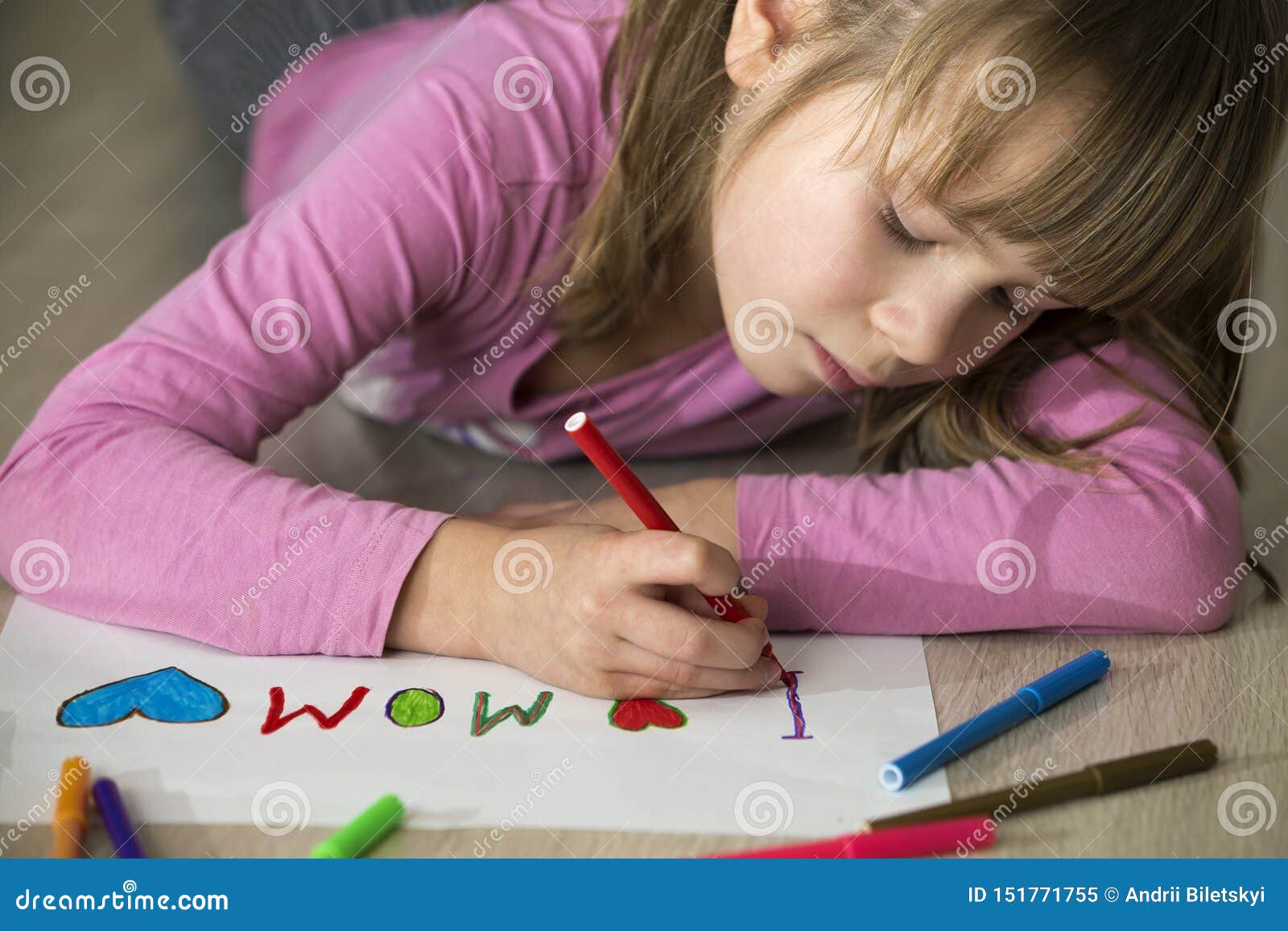Miss circle fundamental paper education art. Girl with Crayons. Мисс циркуль fundamental paper Education. Girl is colouring with Crayons. Child drawing Table close-up.