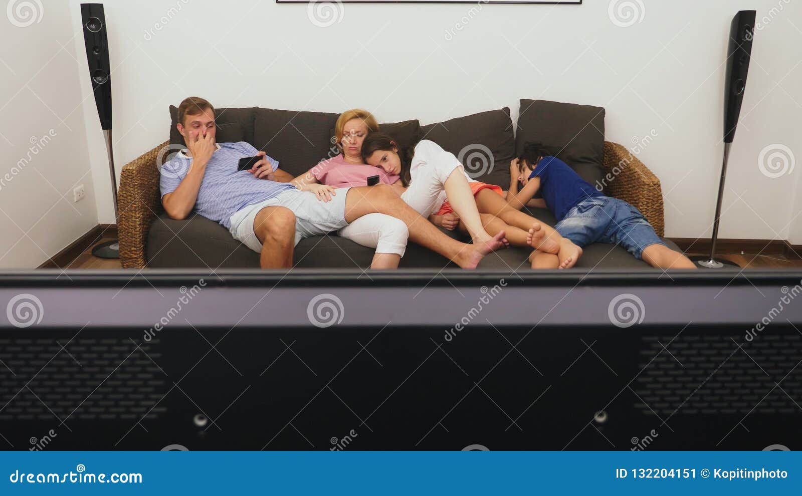 Amateur threesome watching tv