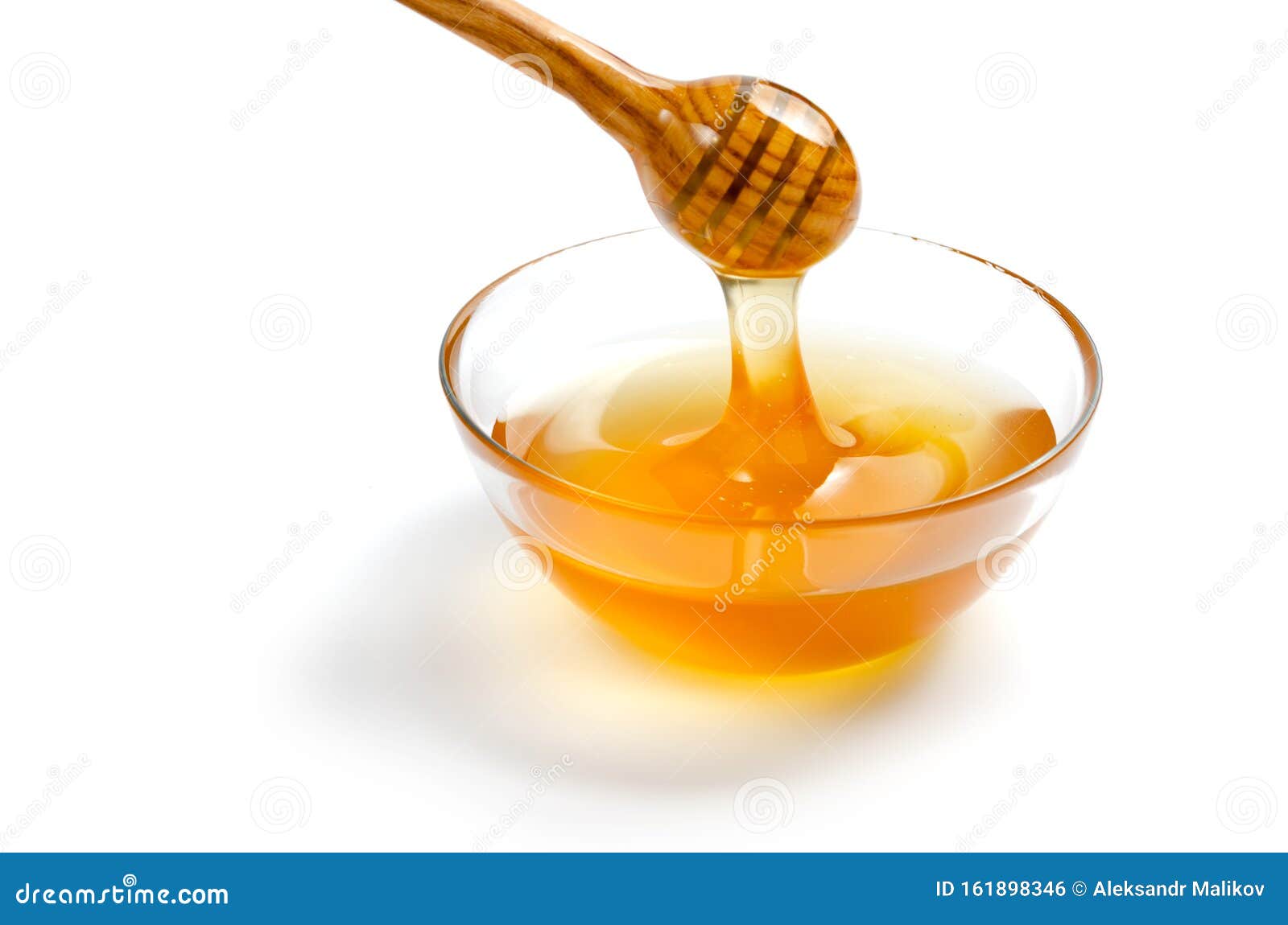 Прозрачная тарелка с медом Мёд течет из ложки в тарелку Белый изолированный  фон Стоковое Фото - изображение насчитывающей флейвор, съешьте: 161898346