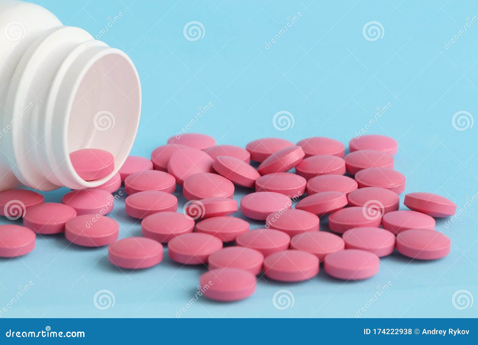 蓝色背景中的一组粉色圆丸和白色瓶子库存照片 图片包括有关心 工具箱 药理 止痛药 医学 174222938