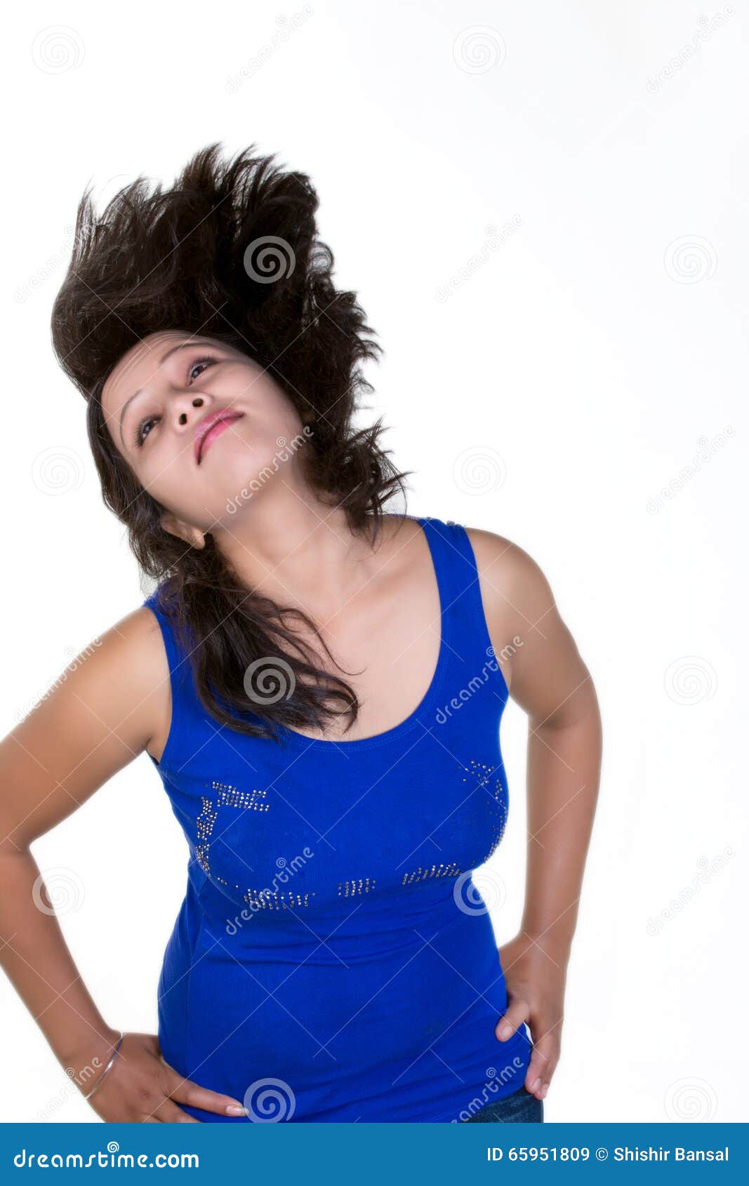 Indian Girl Flipping Her Hair Upwards Isolated Against 