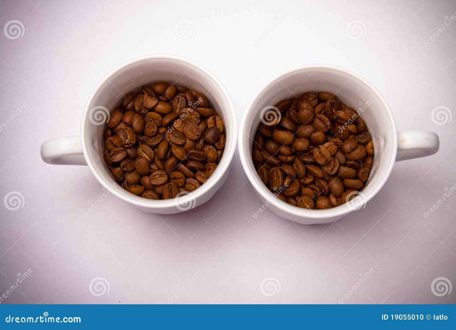 2 cups with coffee beans stock photo. Image of energetic 19055010